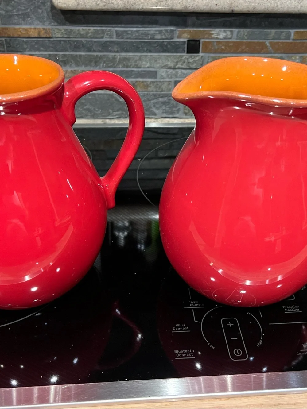 Crate and Barrel Red Ceramic Pitchers with terracotta Interior